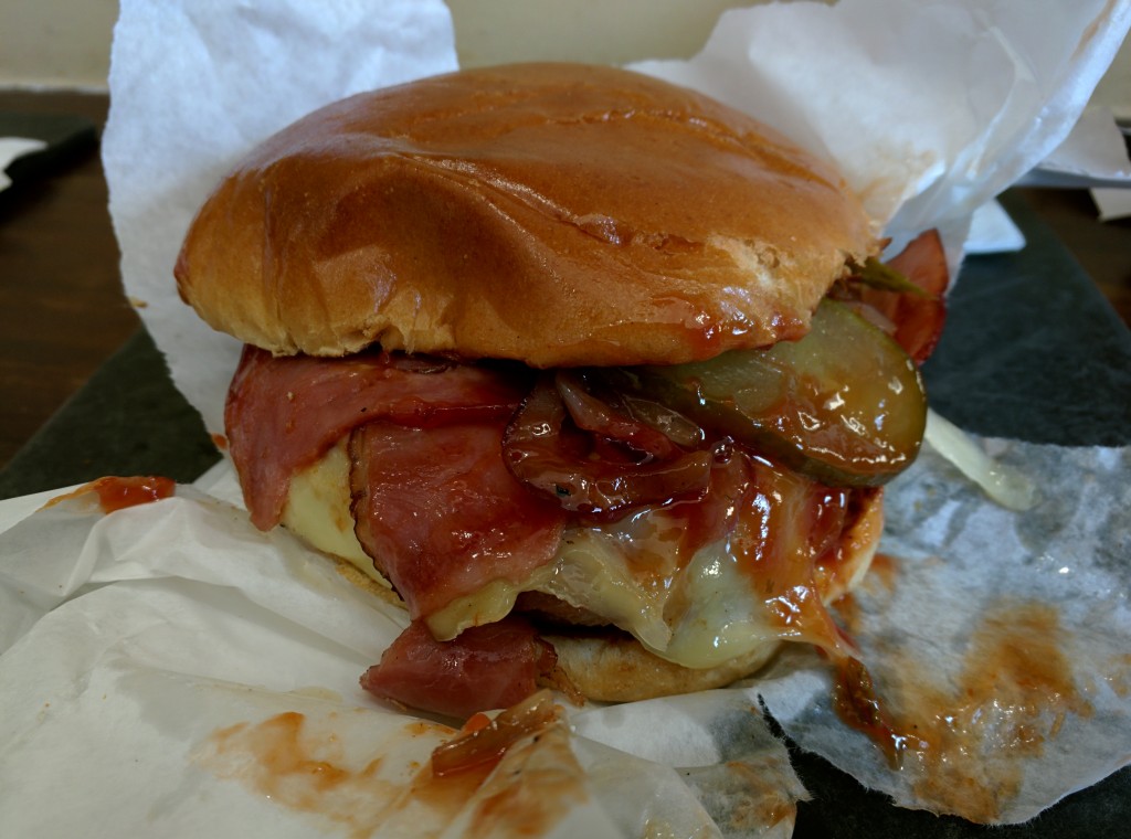 Smokey Jack Burger - 6oz gourmet patty with onion, ketchup, pickles, Monterey Jack cheese, turkey rasher & BBQ sauce.