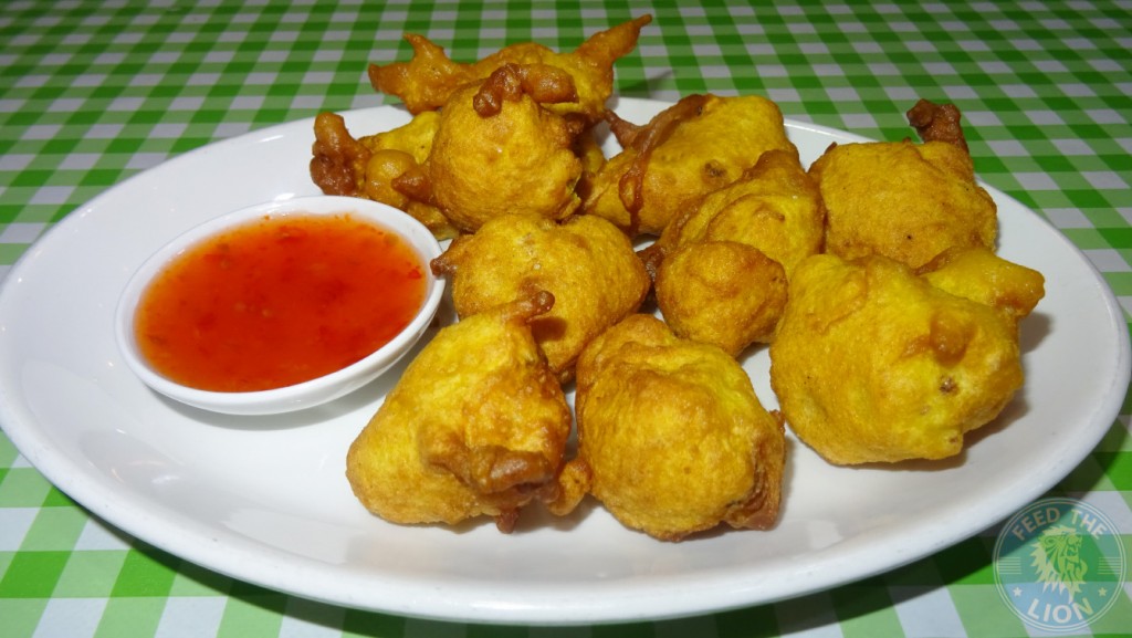 Cauliflower Pakora - Vegetarian. Cauliflower florets coated and fried with batter and served with sweet chillie sauce £5