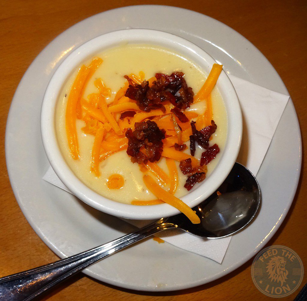 Baked potato soup - Creamy, loaded with potatoes and topped with cheddar cheese and beef bacon. Cup texas road house
