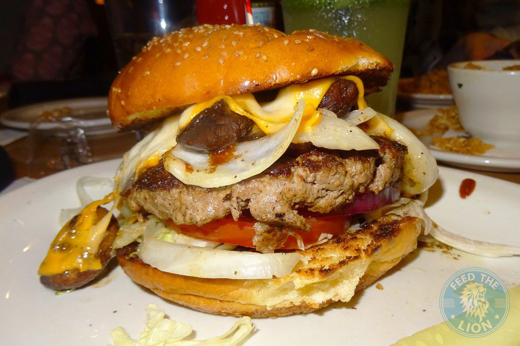 Texas roadhouse Smokehouse burger - 8oz, sauteed mushrooms, onions, bbq sauce, American & jack cheese, lettuce and tomato. 49AED